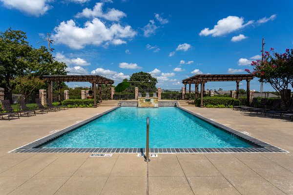 Arbors of Denton pool with hot tub